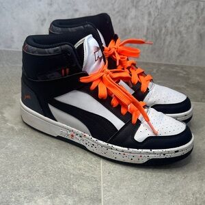 Puma Rebound Lay-ups Black and White High-Tops with Vibrant Orange accents